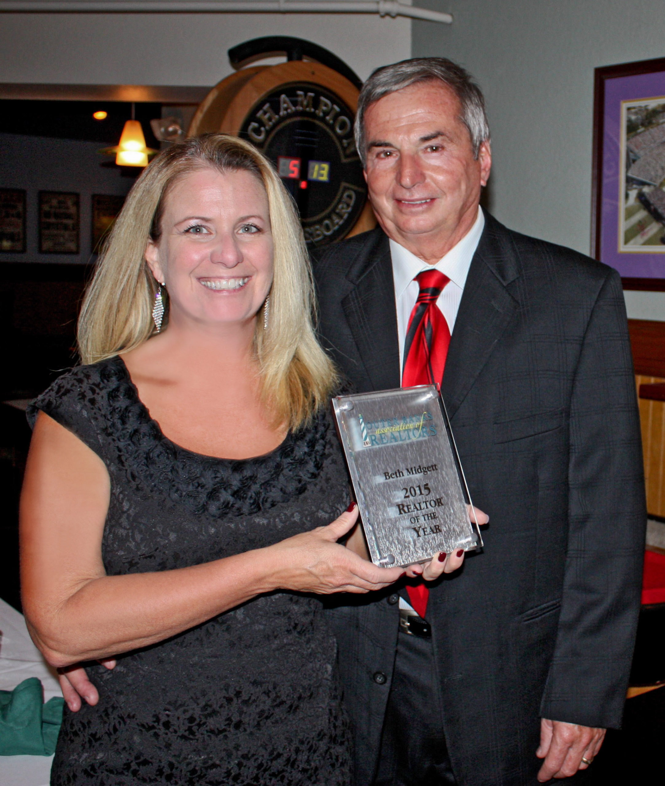 Beth Midgett accepts award for the 2015 REALTOR® of the Year 