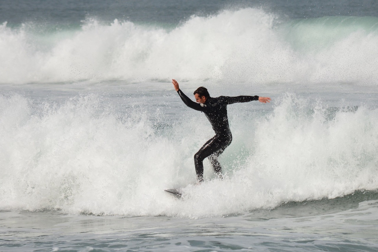 Surfer on a surfboard in the sea