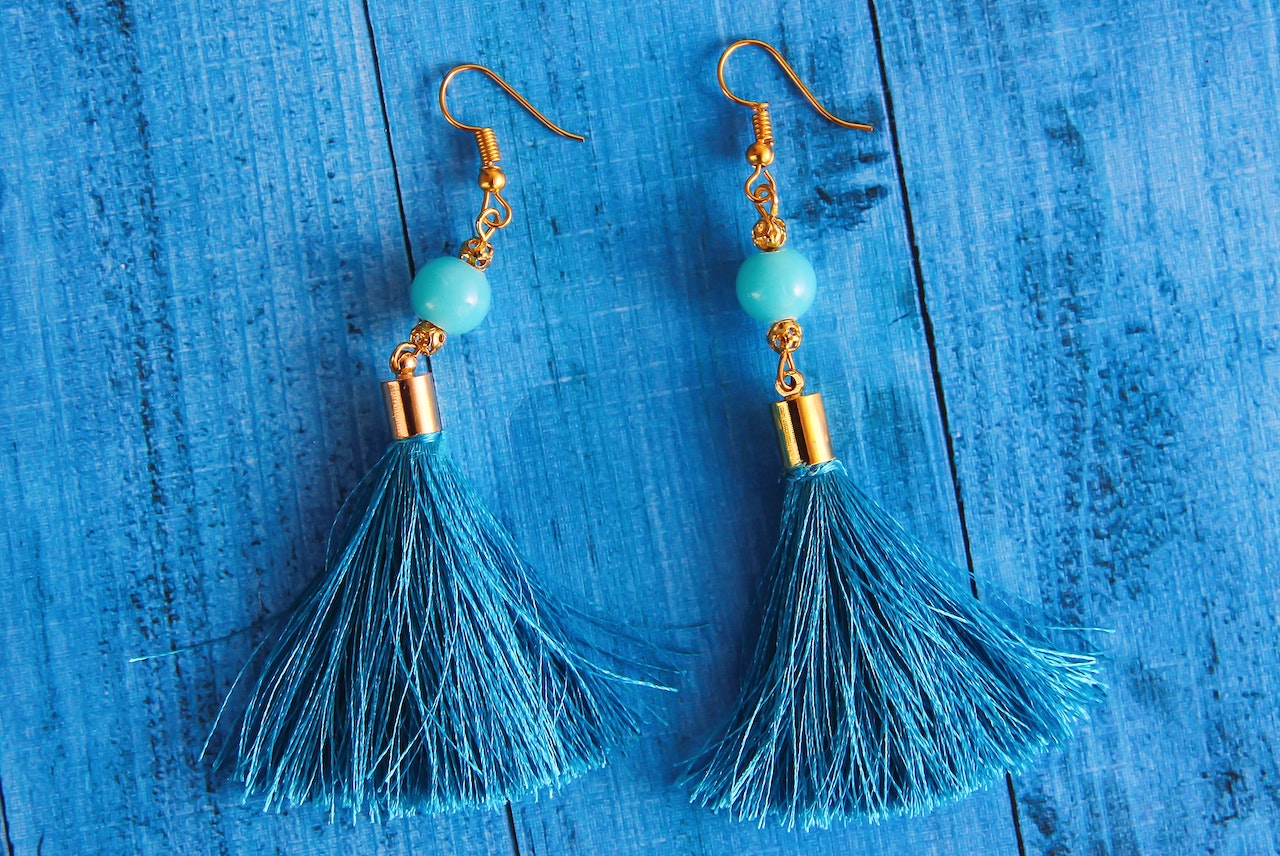 Pair of earrings on the table