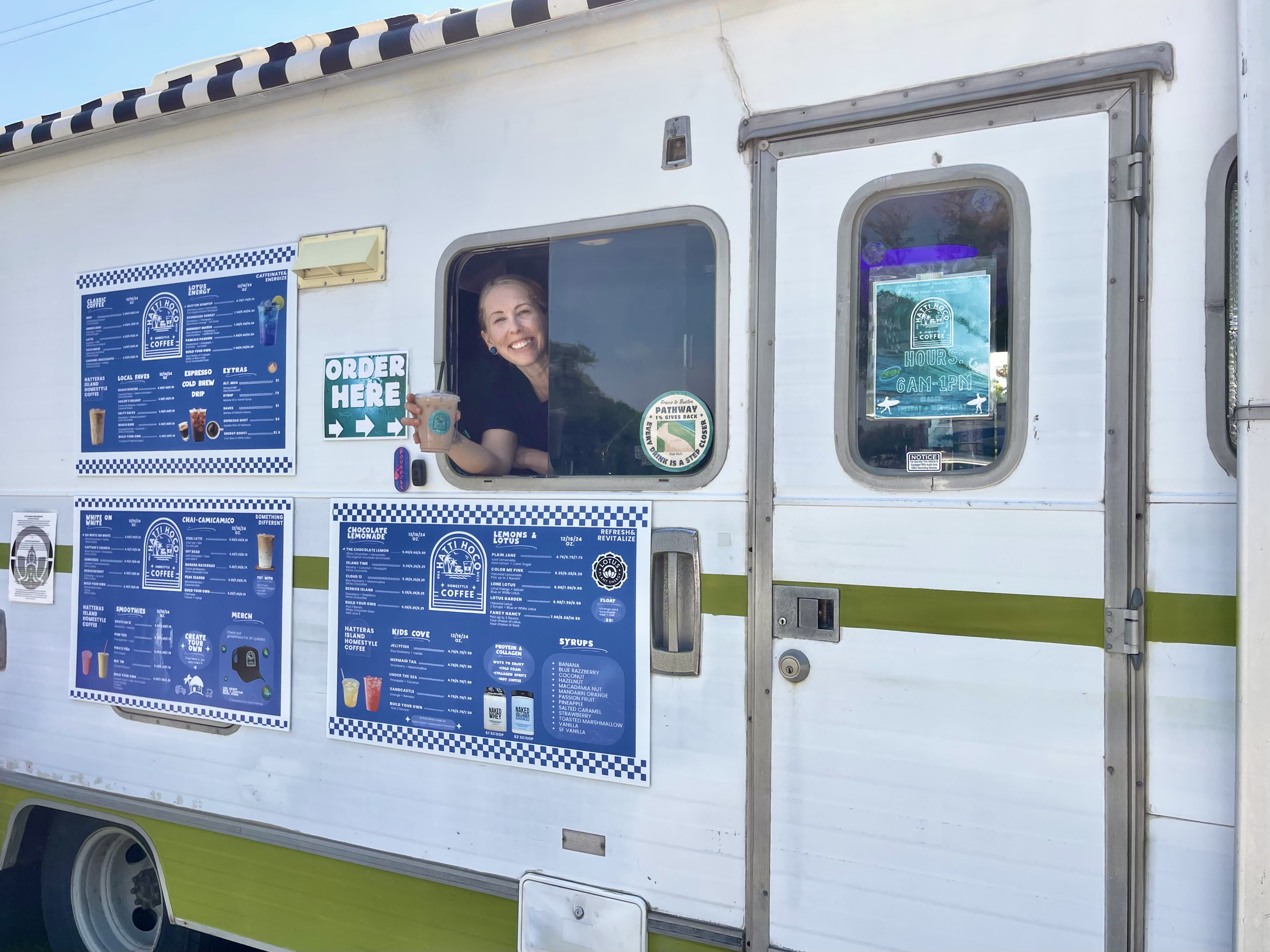 Ally, owner of Hatti HoCo serves fresh coffee from the window of her vintage Winnebago located in Frisco Woods Campground on Hatteras Island